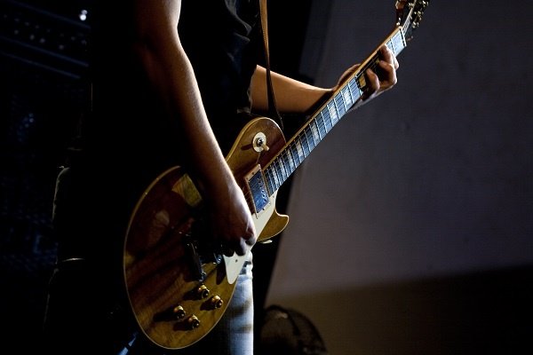 Band Electric Guitar Being Played 45 Degree Angle 1 Band Electric Guitar Being Played 45 Degree Angle 1
