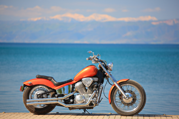Orange Motorcycle Near Water 2 Orange Motorcycle Near Water 2